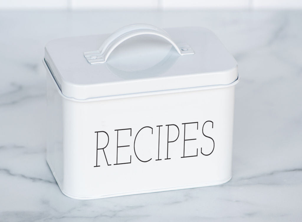 Galvanized Steel Modern Recipe Tin can provide a nice farmhouse accent to your kitchen or living space. Made of high-quality metal and is perfect for storing recipes. Don’t want to use it for recipes??? This nicely finished tin looks darling on any counter or open shelf space.  Color: White - RECIPE is printed in BLACK Box Dimensions: 6” X 4” X 4.5” fits 4 x 6 recipe cards