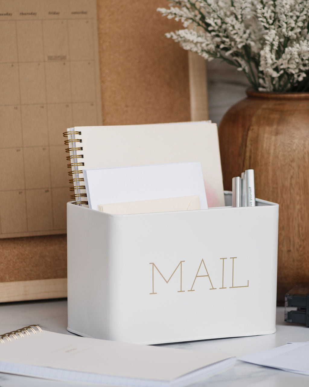 A versatile white mail organizer can be used in the home, office, hallway, entryway, or any space where you need additional storage.