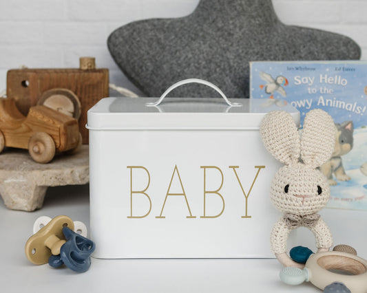 Stylish Baby Caddy Box: this cute metal box comes in a lovely design and gender-neutral white color, making it the perfect storage solution for a baby girl and boy room.