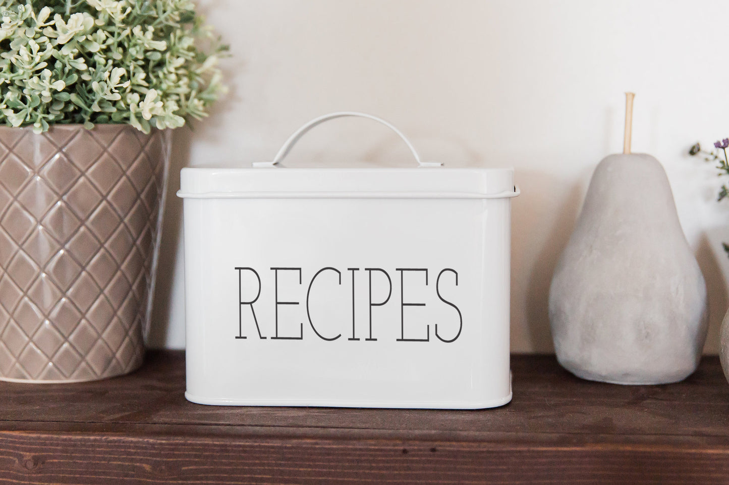 Galvanized Steel Modern Recipe Tin can provide a nice farmhouse accent to your kitchen or living space. Made of high-quality metal and is perfect for storing recipes. Don’t want to use it for recipes??? This nicely finished tin looks darling on any counter or open shelf space.  Color: White - RECIPE is printed in BLACK Box Dimensions: 6” X 4” X 4.5” fits 4 x 6 recipe cards